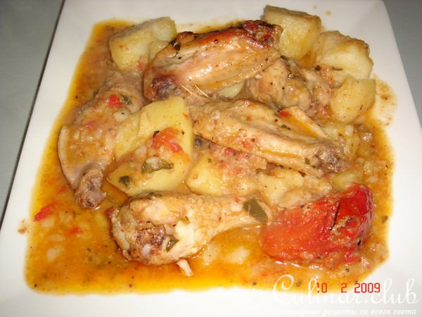 Маринованные куриные куски запечёные с картошкой