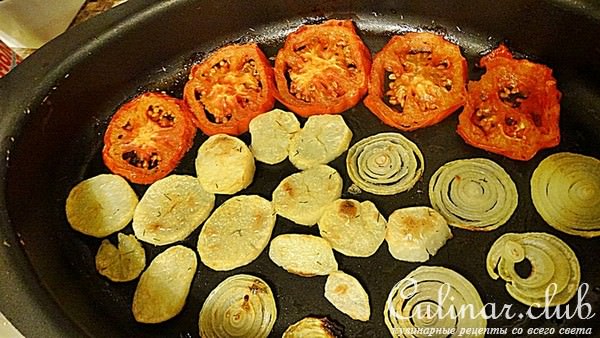 Жаренная на гриле рыба с овощами.