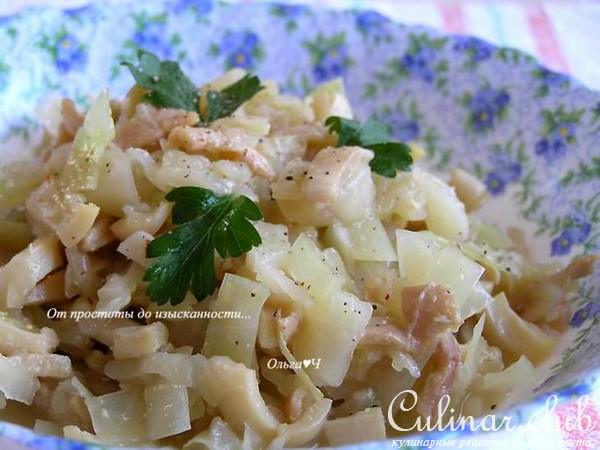 Кальмары, тушеные с капустой в белом вине