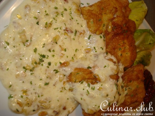 Рыба с сырным соусом и кедровыми орешками