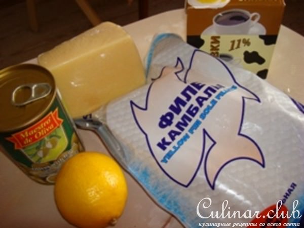 Камбала с оливками запеченая