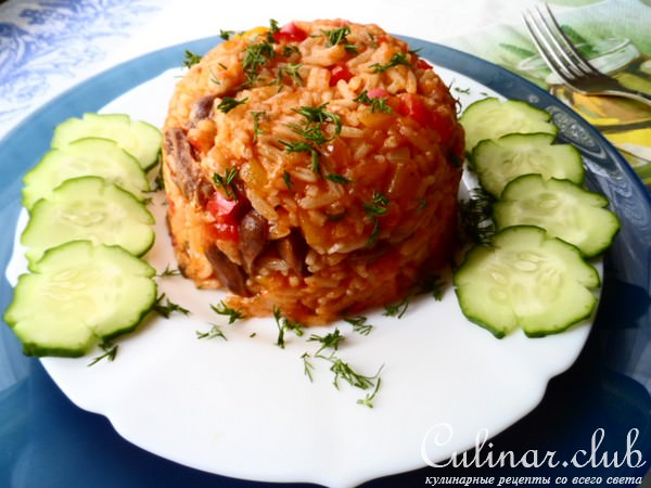 Рис с куриными сердечками и овощами.