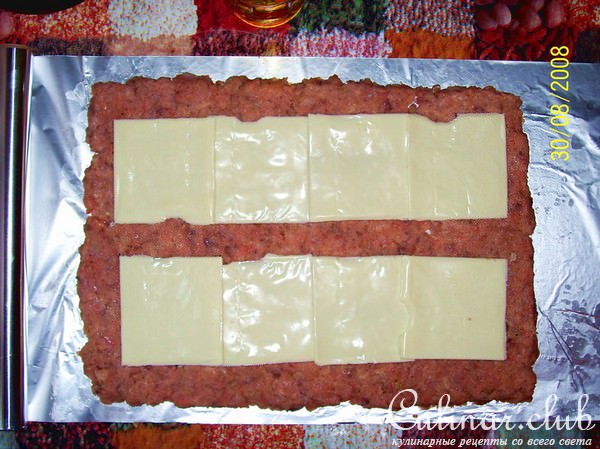 Рулет из горбуши с сыром, яйцом и зеленым луком