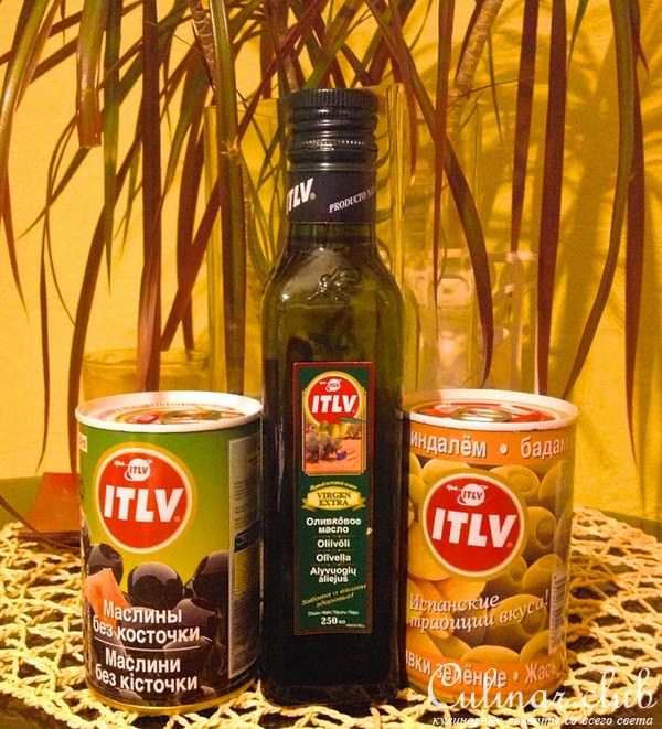 Теплые оливки и маслины с лимоном и зеленью